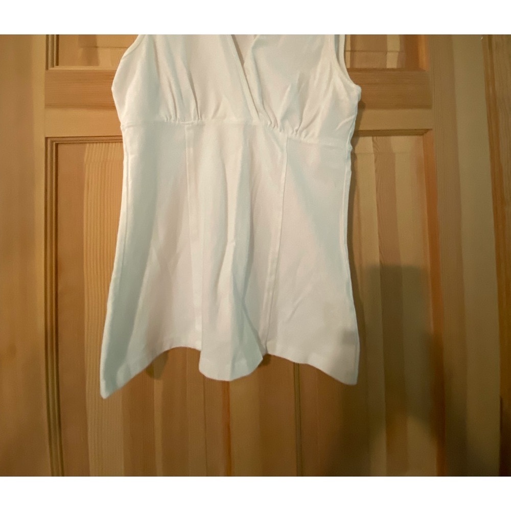 Three dots, white tank top